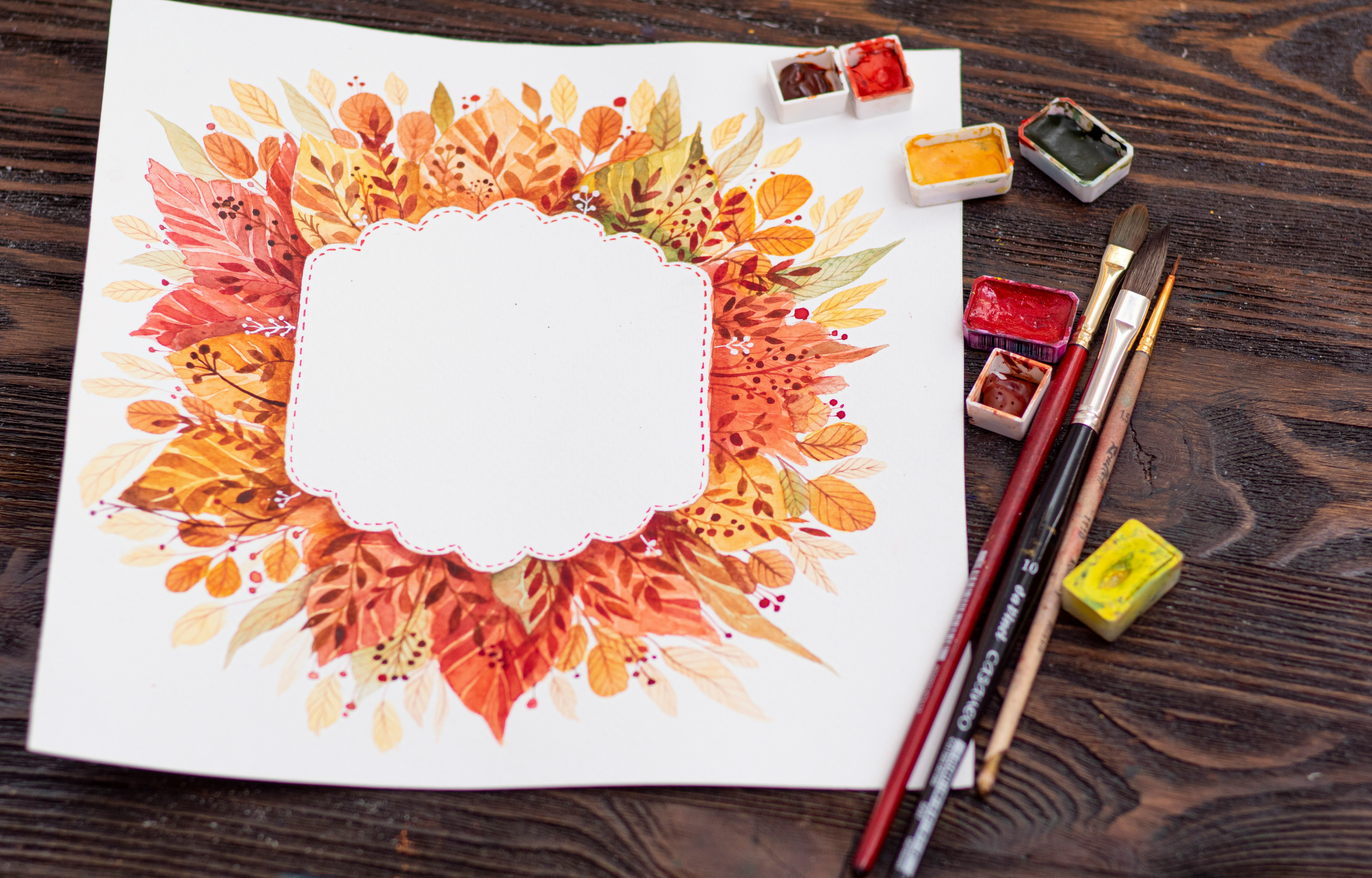 white and red floral ceramic plate